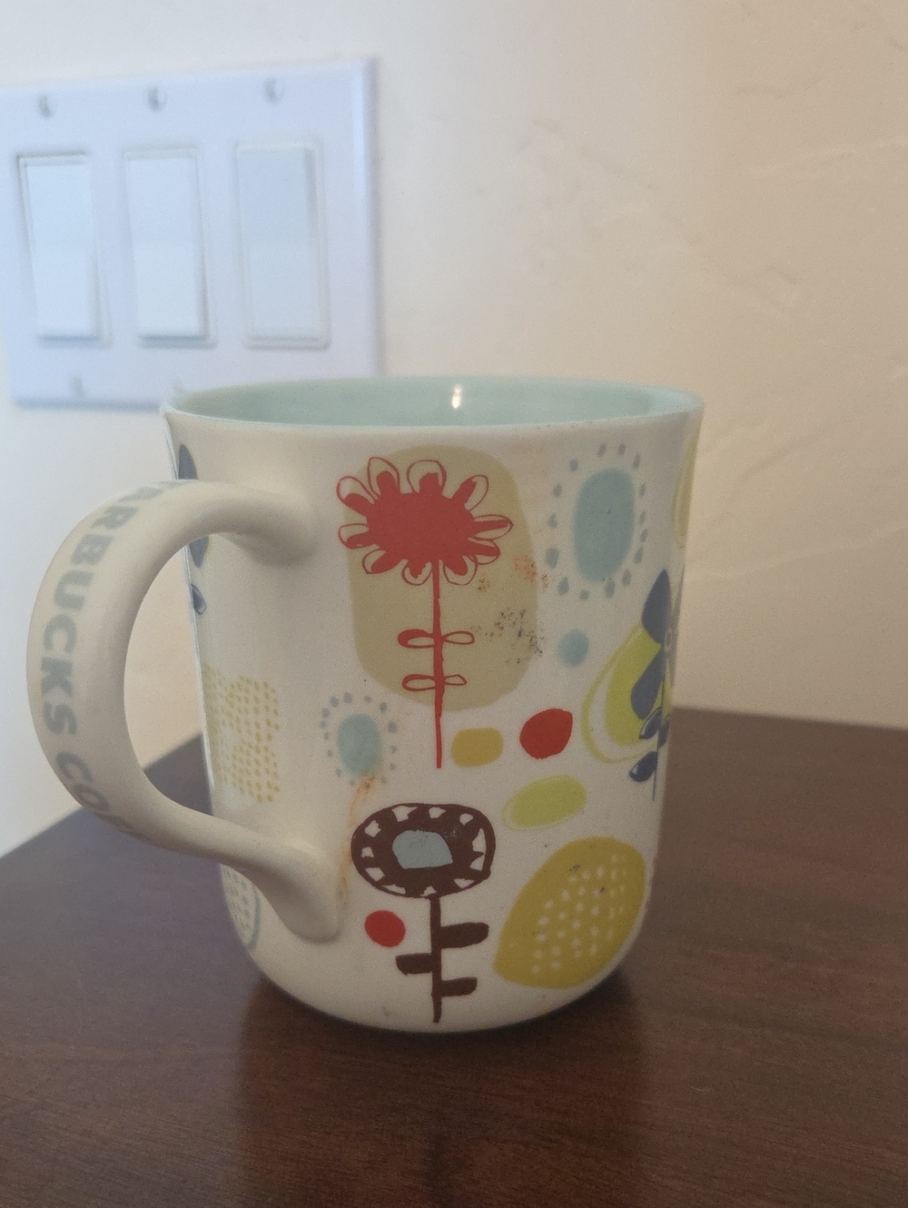 Starbucks White Ceramic Mug with Pastel Floral Accents